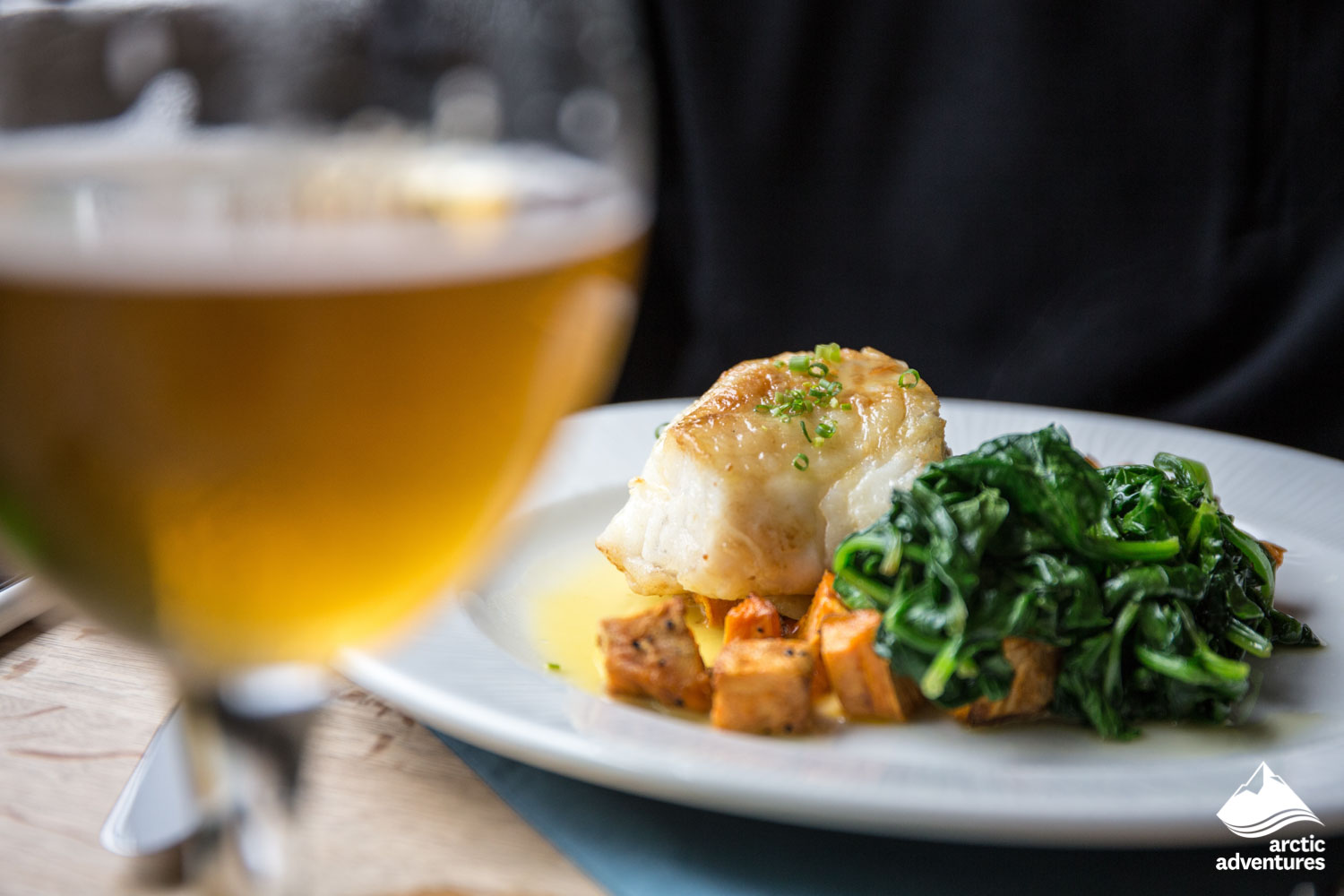 beer and fish dish in Icelandic restaurant