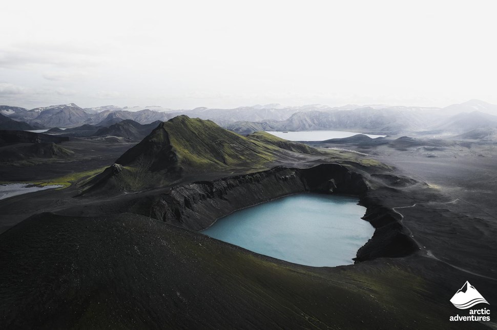blue lake inside the crater in Iceland