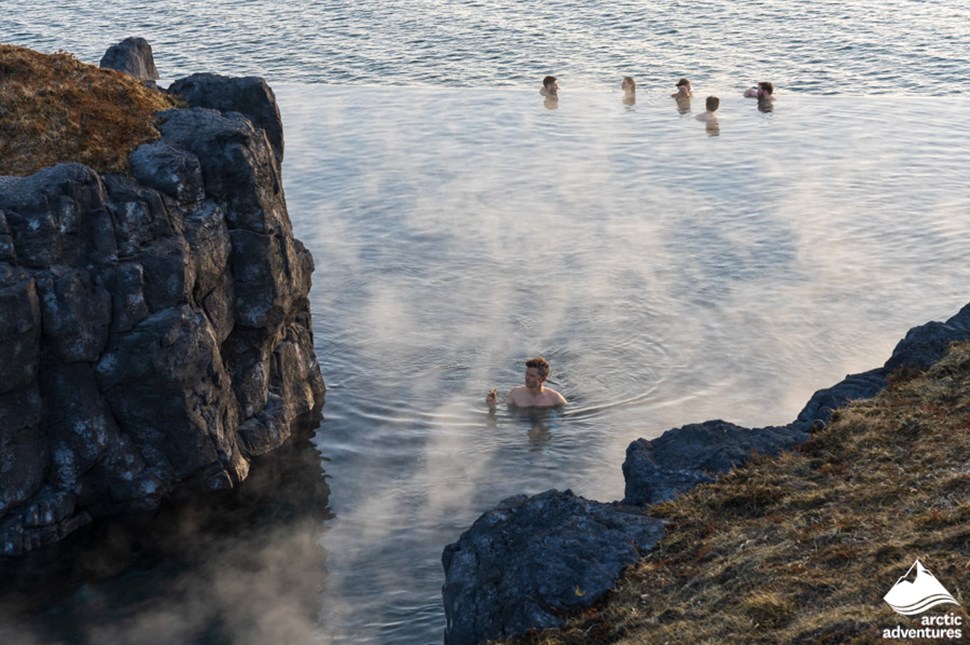People Relaxing in Sky Lagoon in Iceland