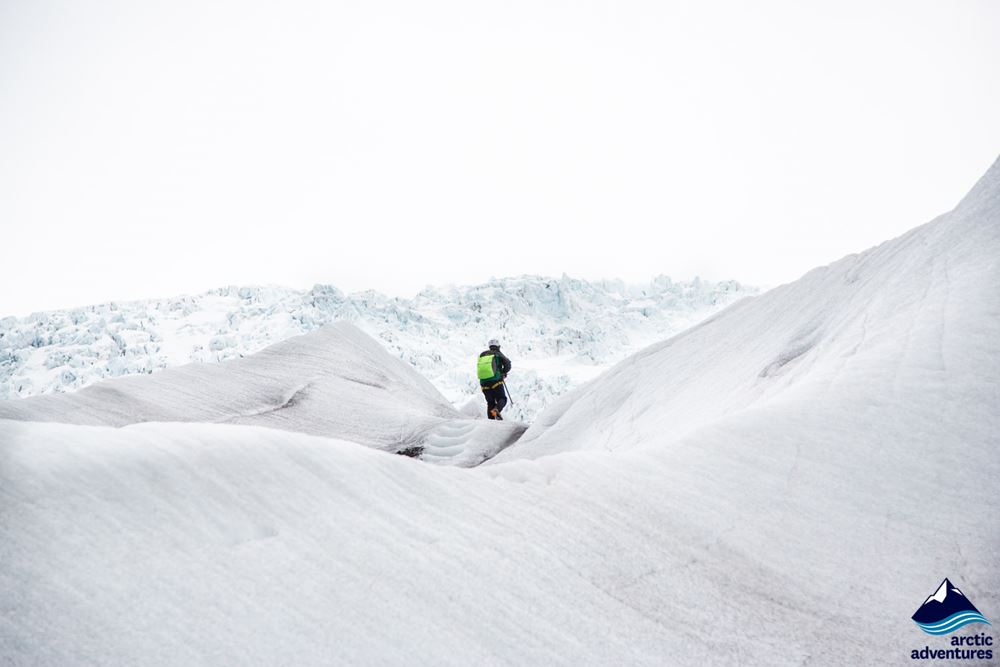 Person walking on a glacier