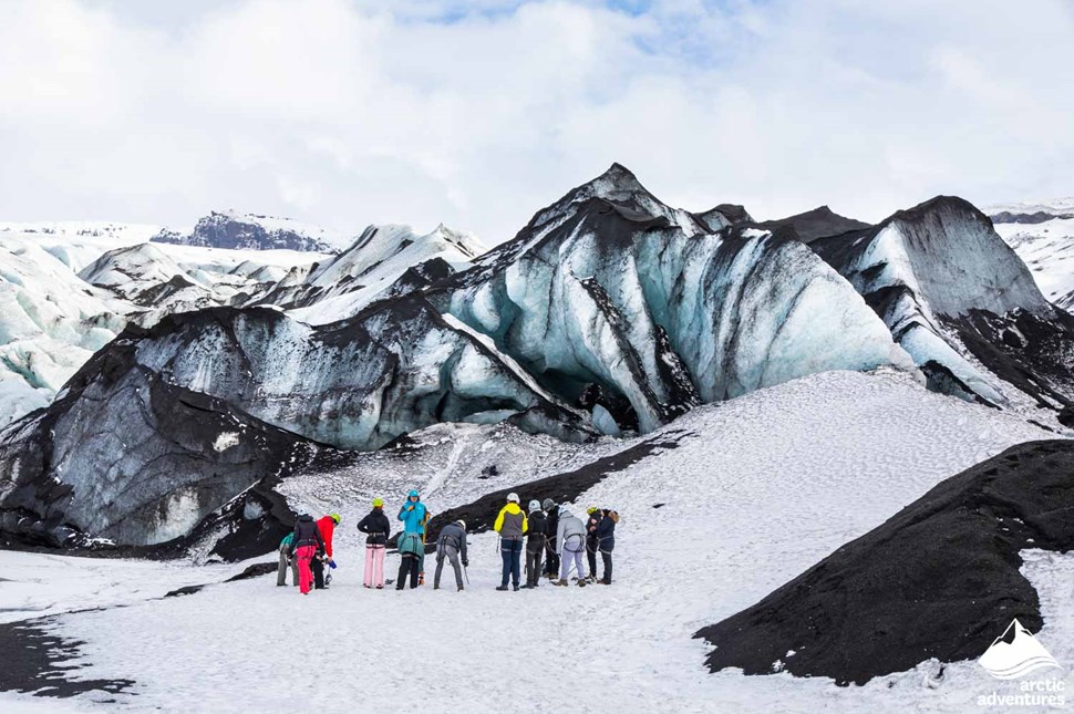 Group standing by Sólheimajökull glacier