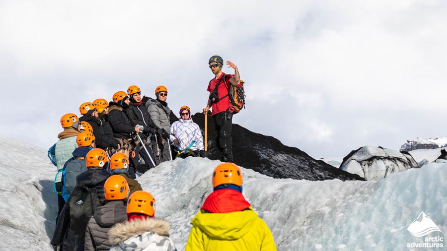 Guide and group on a glacier