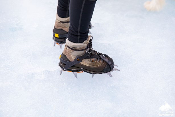 Boots with crampons on ice