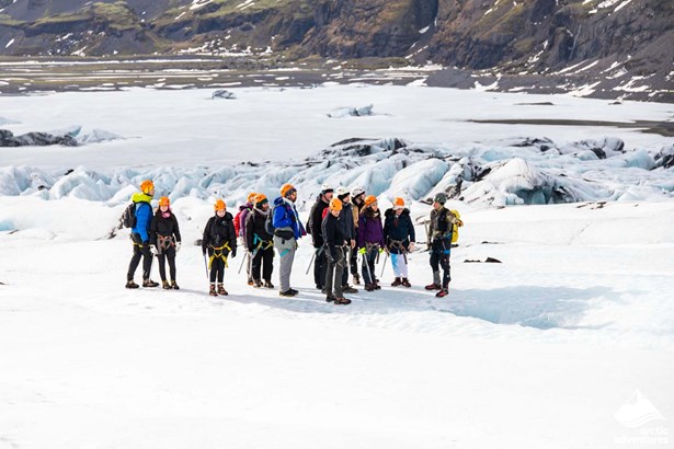 Guide educates people about glacier in Iceland