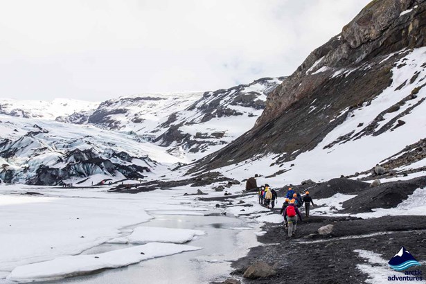 Group Hiking Towards Solheimajokull Glacier