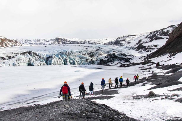 Group Walking to Solheimajokull Glacier in Iceland