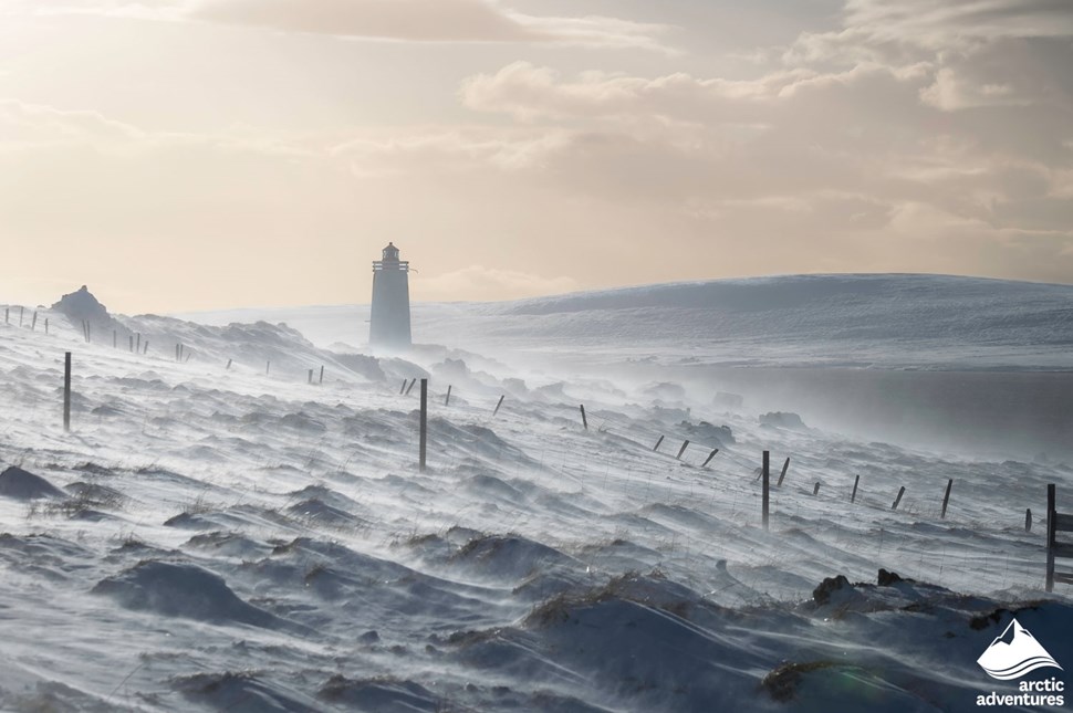 Lighthouse during Winter Storm in Iceland