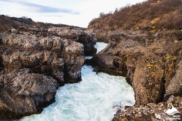 Waterfall Between the Rocks in Iceland