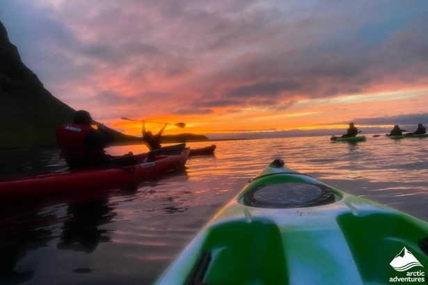 Group Kayaking during Sunset in Iceland
