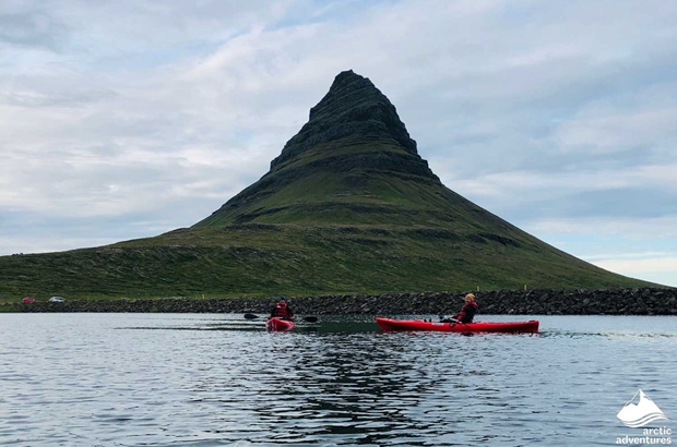 Two Kayakers by Kirkjufell Mountain in Iceland