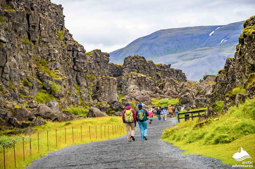 People Walking at Thingvellir National Park in Iceland