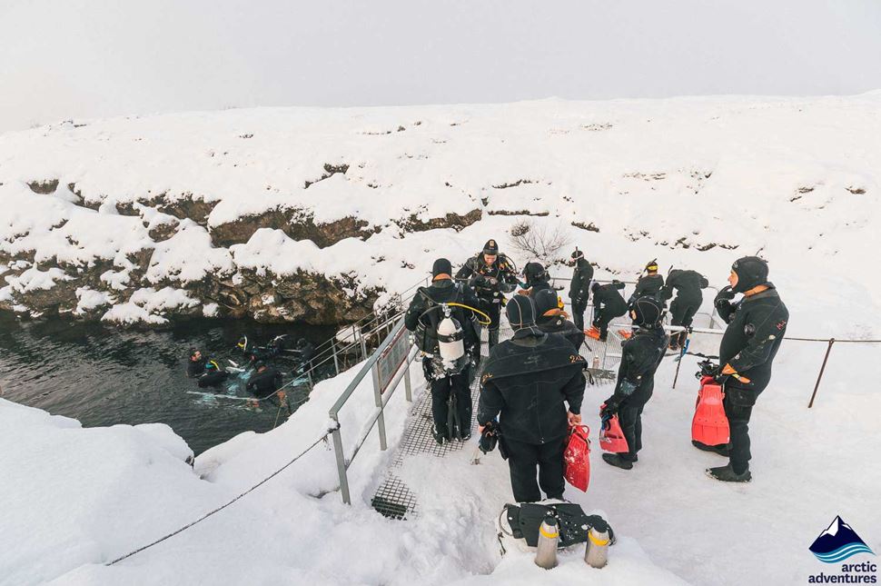 People Getting Ready for Snorkeling in Iceland