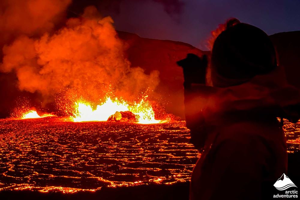 Woman Watching Volcano Eruption