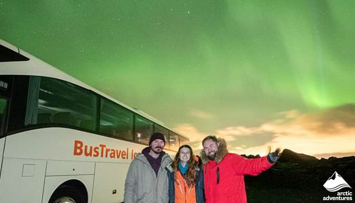 People Enjoying Northern Lights Tour by Bus