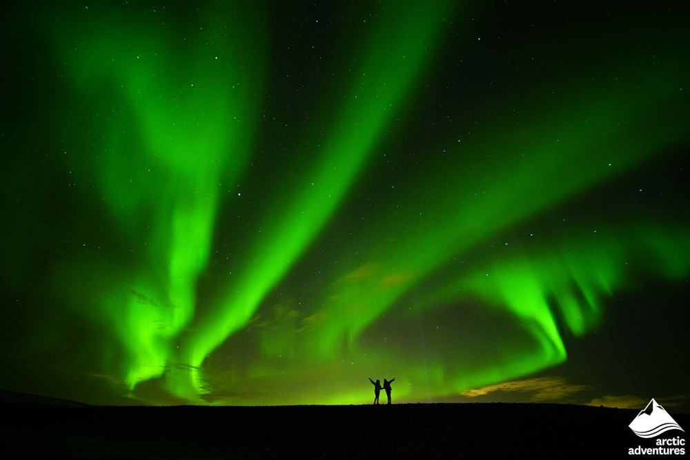 Couple Under the Northern Lights