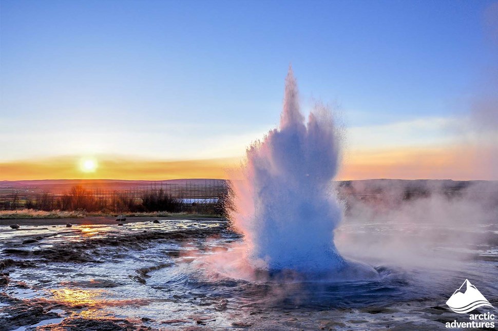 Erupting Geyser at Sunset in Iceland