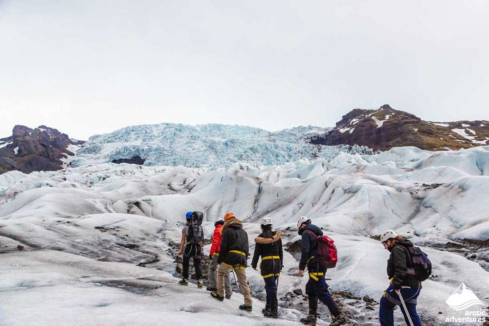 Tour Group Hiking Towards Glacier