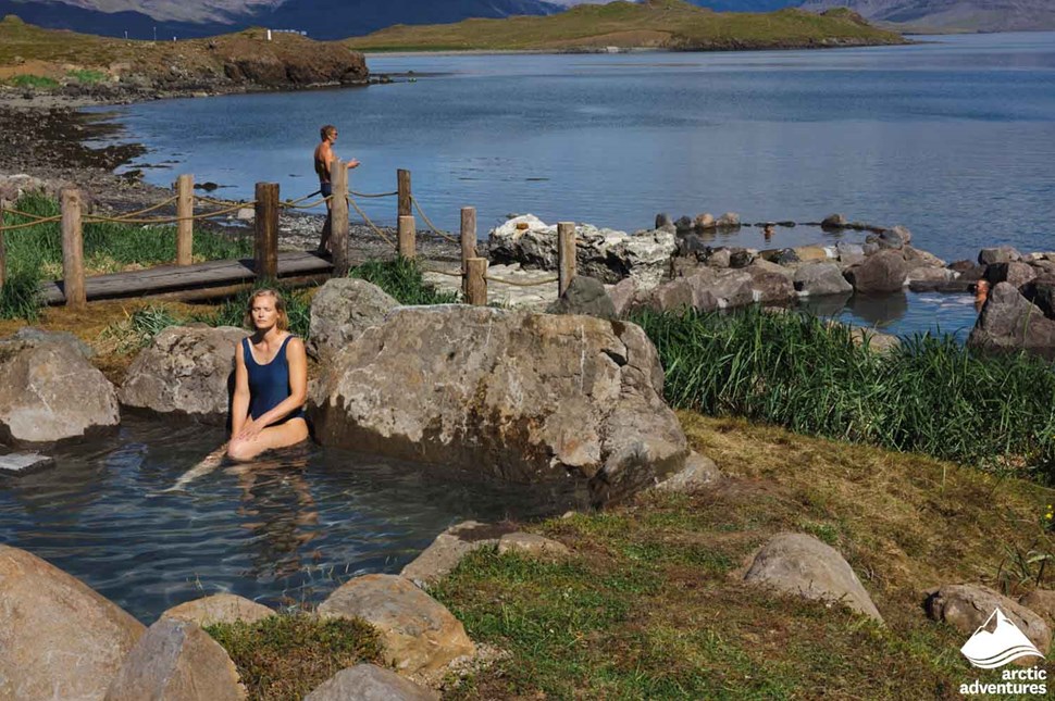 People Bathing in Hvammsvik Hot Springs