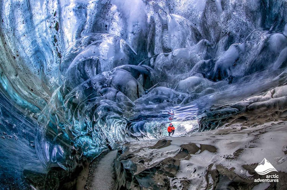 Man at Crystal Ice Cave in Iceland