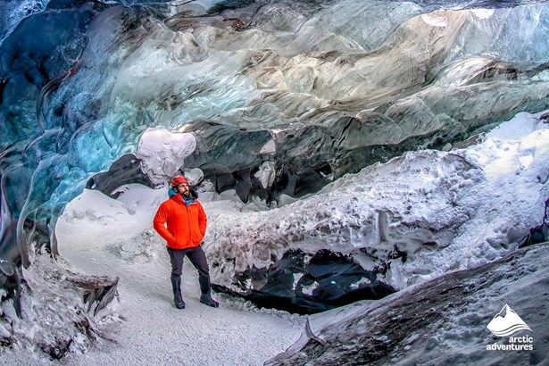 Man in Ice Cave in Iceland
