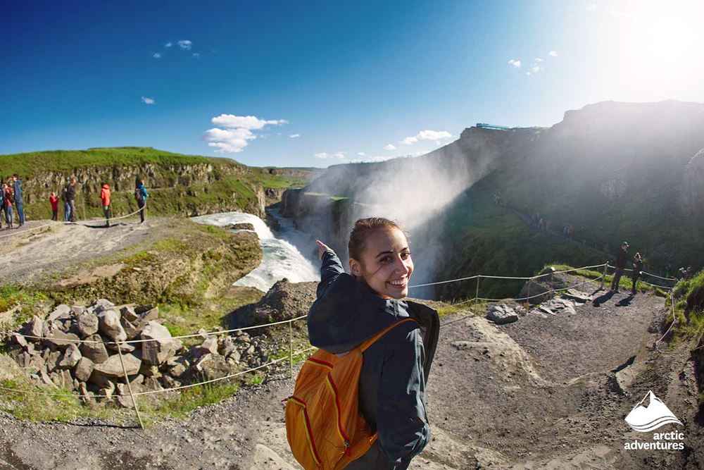 Happy Woman by Gullfoss Waterfall
