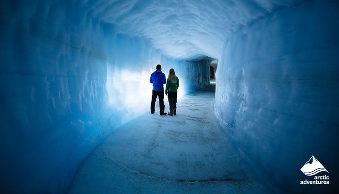 Couple in Man Made Ice Tunnel