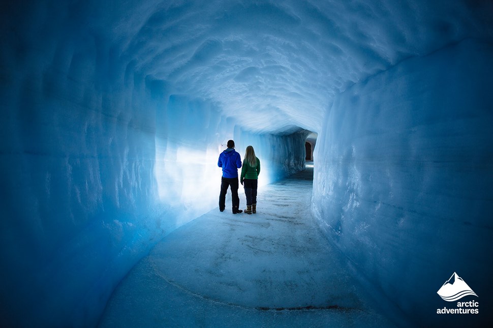 Couple in Man Made Ice Tunnel