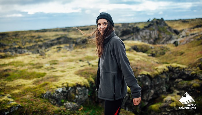 Happy Woman in Icelandic Lava Field