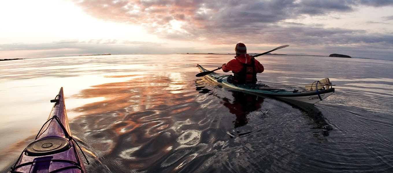 Midnight Kayaking Under Mt. Kirkjufell In Snaefellsnes
