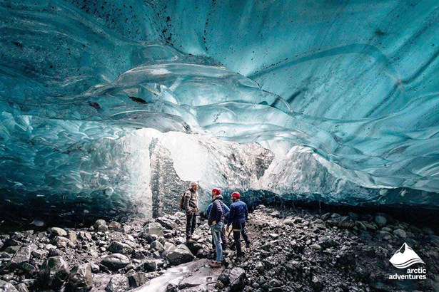 Group Inside of Ice Cave in Iceland