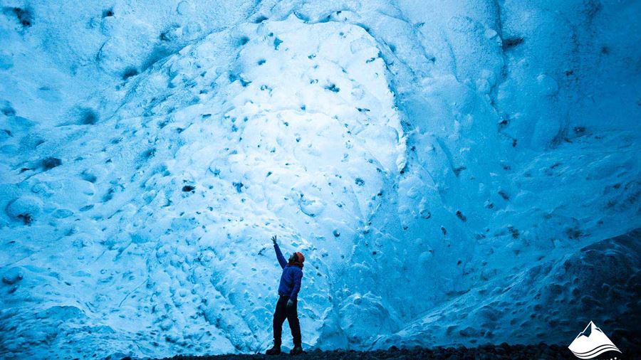 Man in Blue Ice Cave