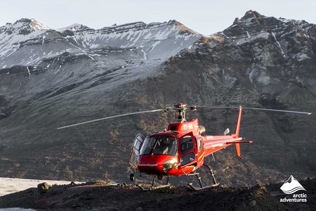 Helicopter Landed by Mountains in Iceland