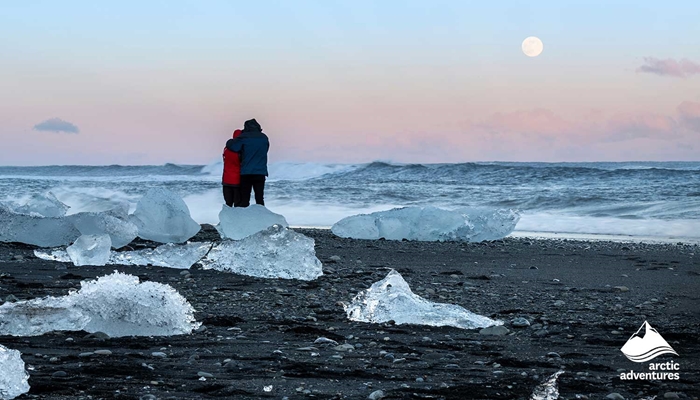 Couple at Diamond Beach in Iceland
