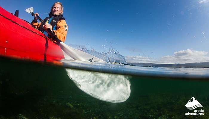 Woman Sea Kayaking in Iceland
