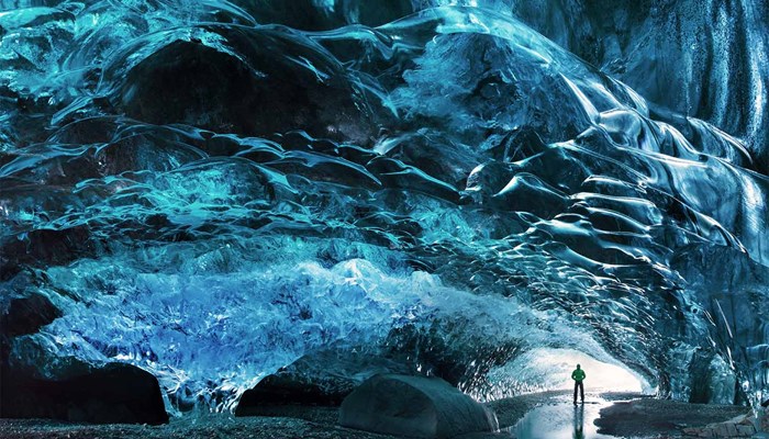 Iceland's Crystal Ice Caves Carve Walkways Deep Within A Glacier