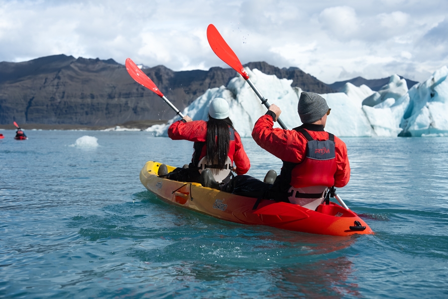 Two People Kayaking in Glacier Lagoon