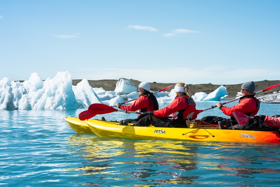 Three People Kayaking in Iceland