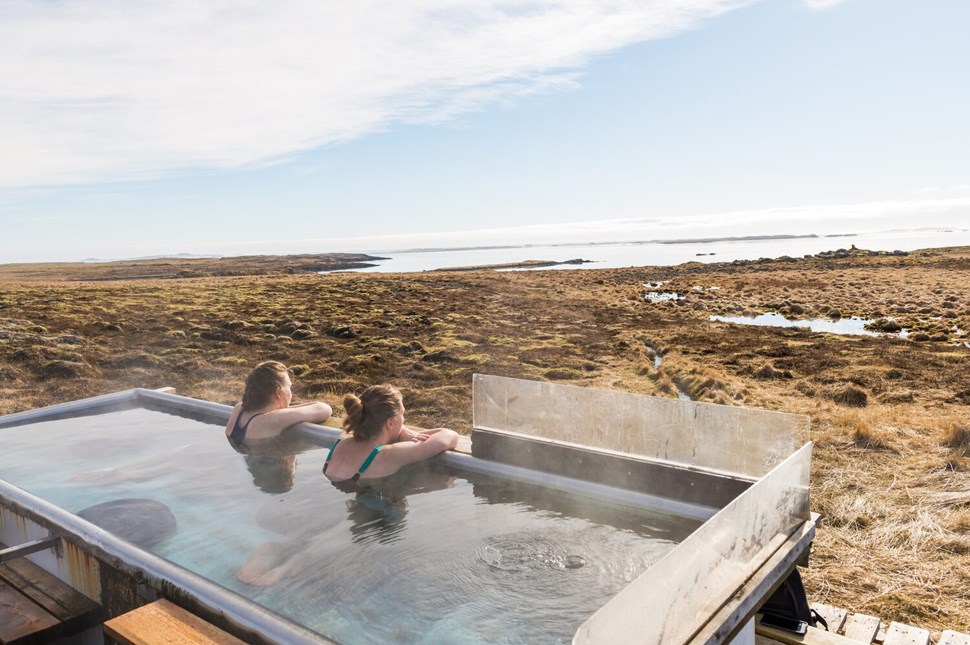 Two Girls Bathing In Natural Geothermal Hot Spring