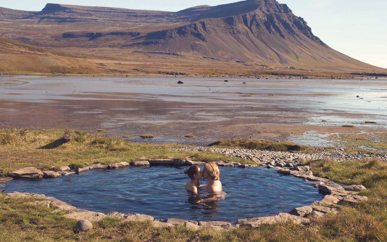 Couple Kissing In Krosslaug Hot Spring Iceland