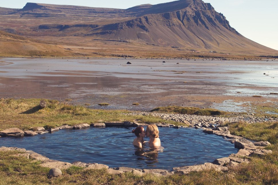 Couple Kissing In Krosslaug Hot Spring Iceland