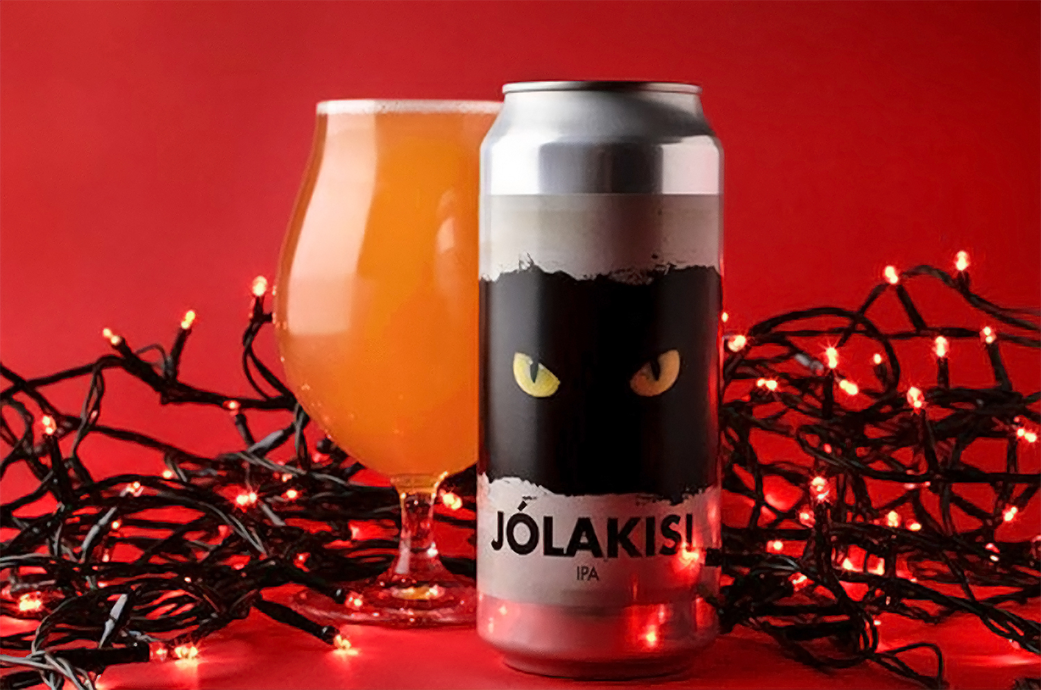 Christmas beer Jolakisi IPA in a glass and in a can