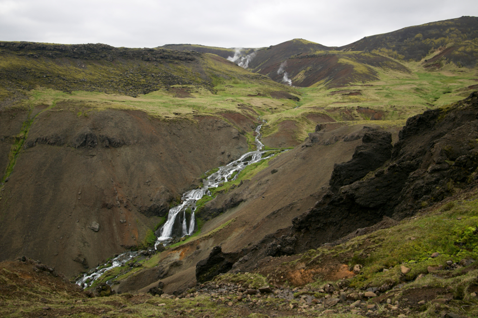 Water trickling through the hills from the steaming Reykjadalur Valley