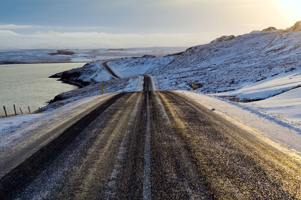 Snowy road and mountains in Iceland
