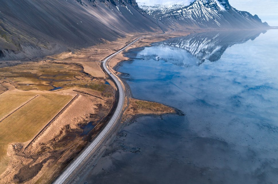 Aerial view of the mountains and a road in Iceland