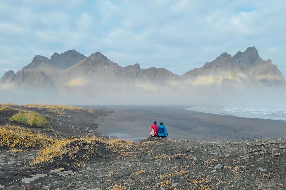 Couple hugging in the mountains in East Iceland