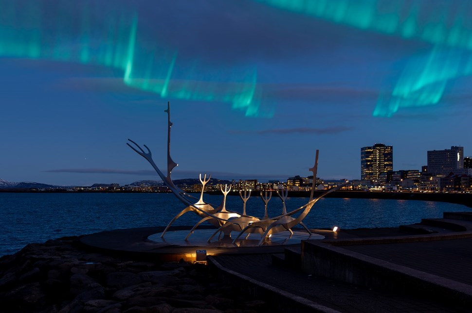 Northern Lights in Reykjavik, near Sun Voyager sculpture