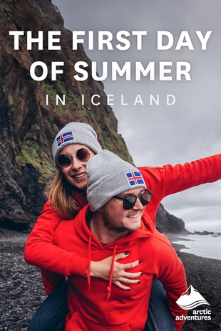 Couple with Icelandic flag hats hugging 