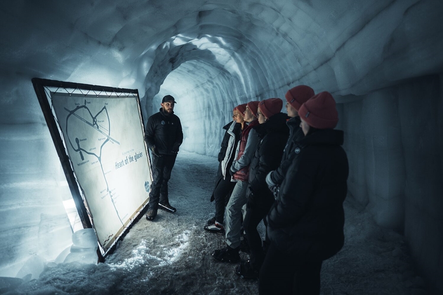 Group of people in ice tunnel