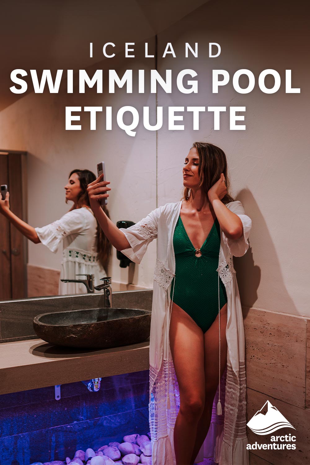 Woman in bathing suit taking selfie in changing room