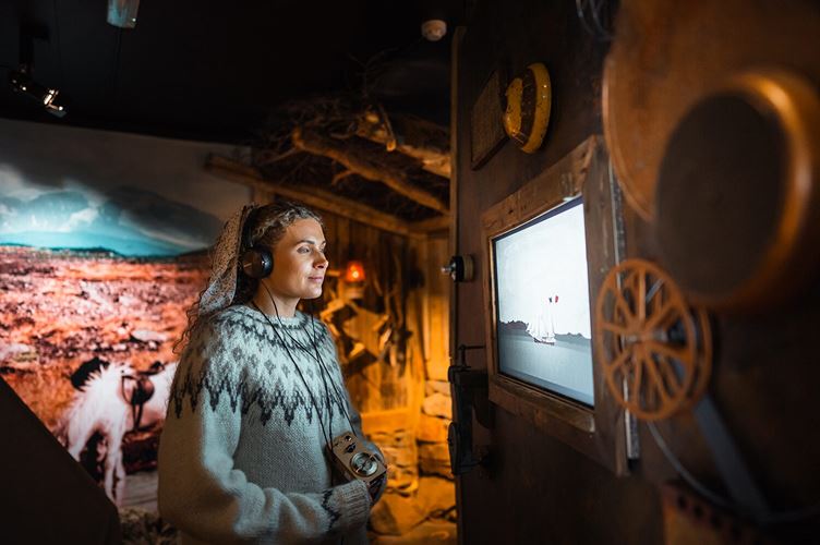 Woman exploring exposition in Wilderness Center